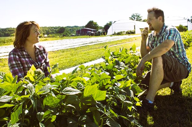 Woman and man working on the farm